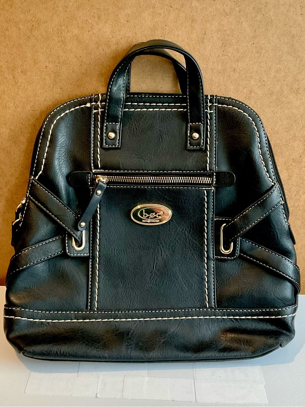 B.O.C. Black backpack white stitching and a gold logo plate - EUC